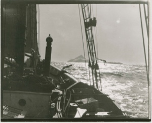 Image of The Bowdoin Sailing through icebergs